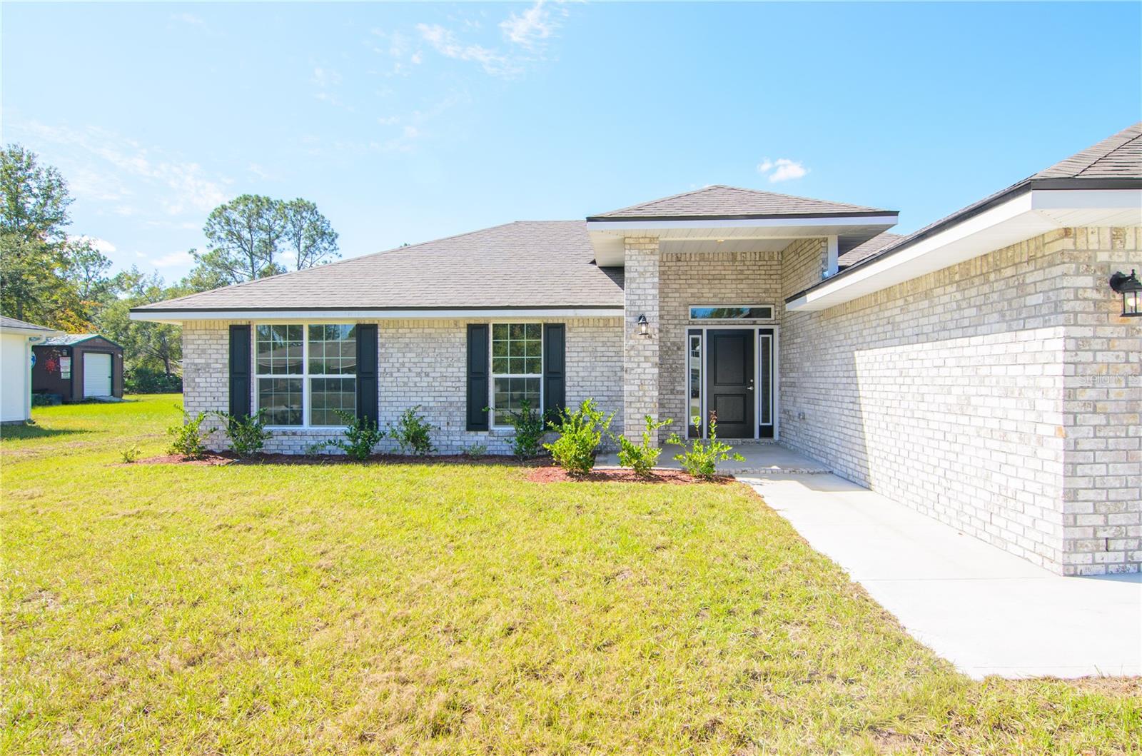 Single Family Residence em PALM COAST, FL - Daniel Dourado
