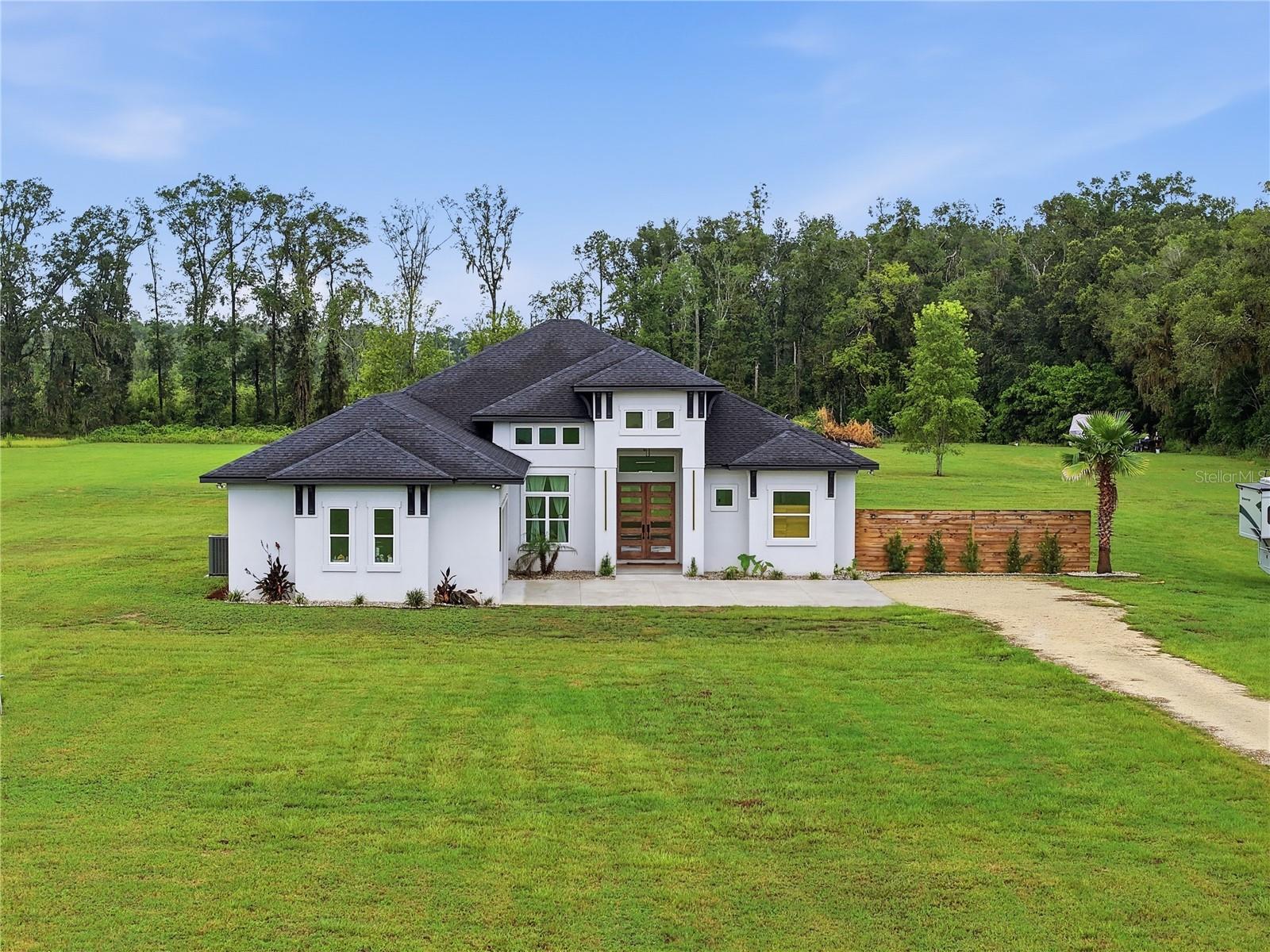 Single Family Residence em ALACHUA, FL - Daniel Dourado