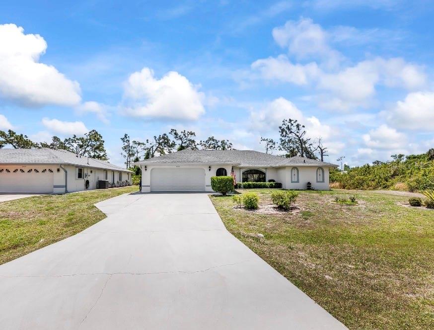 Single Family Residence in PORT CHARLOTTE, FL - Daniel Dourado