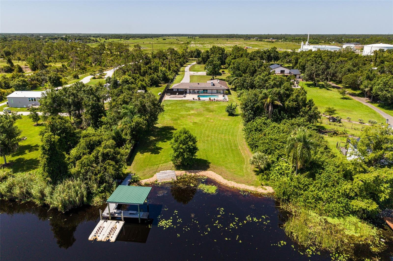 Single Family Residence em PUNTA GORDA, FL - Daniel Dourado