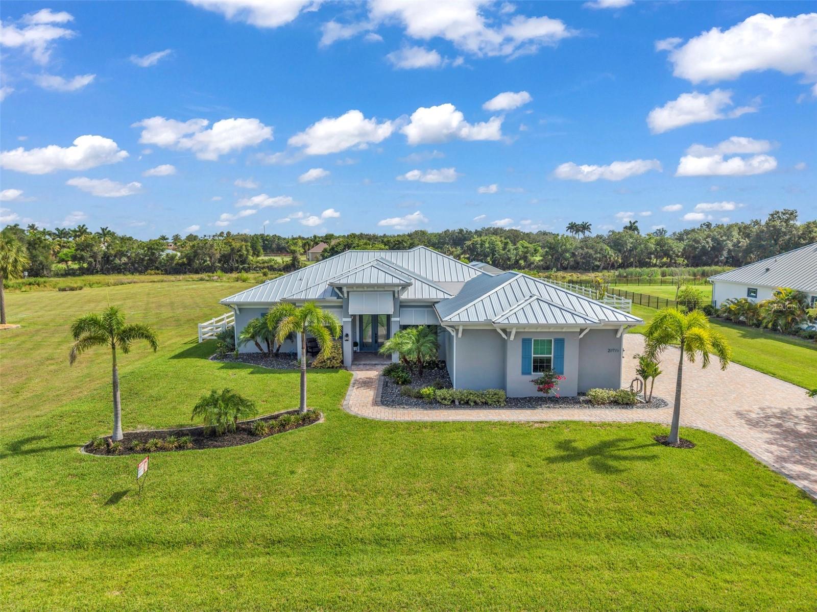 Single Family Residence em PUNTA GORDA, FL - Daniel Dourado