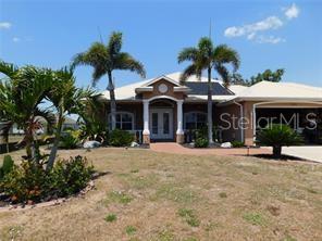 Single Family Residence em PUNTA GORDA, FL - Daniel Dourado