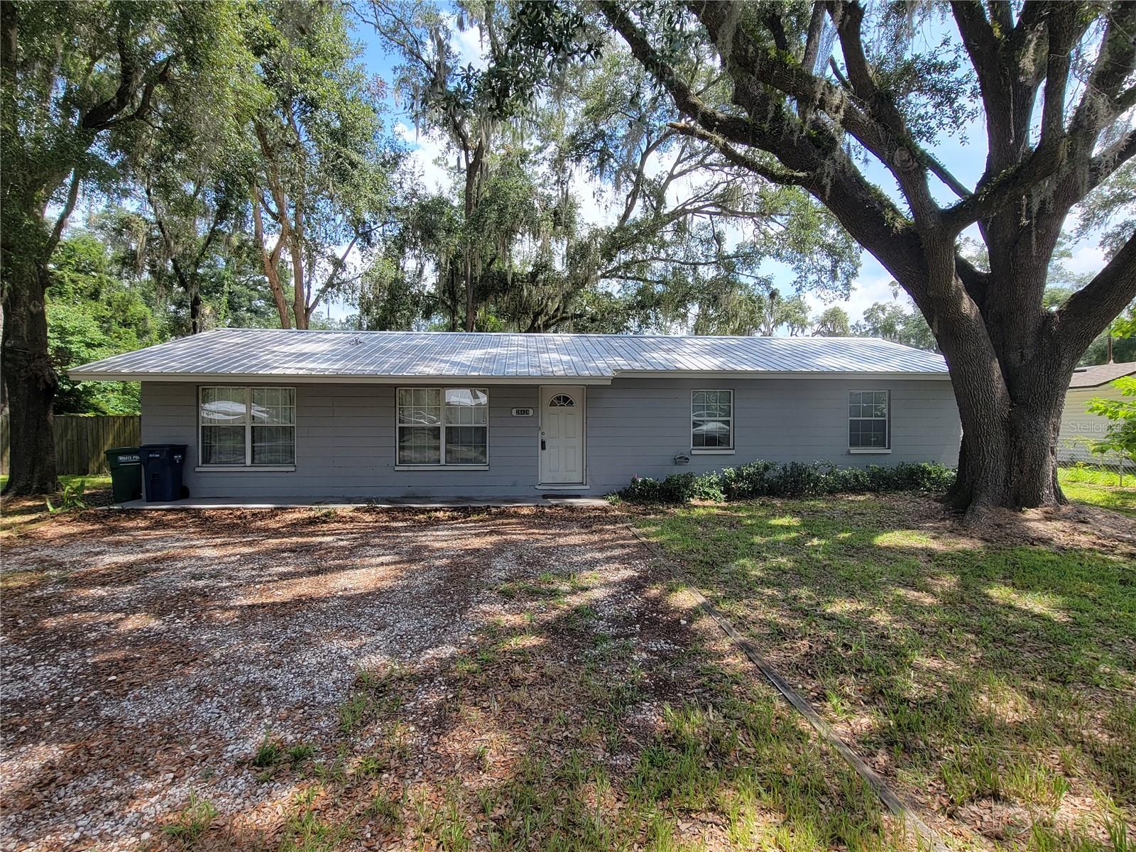 Single Family Residence em NEWBERRY, FL - Daniel Dourado