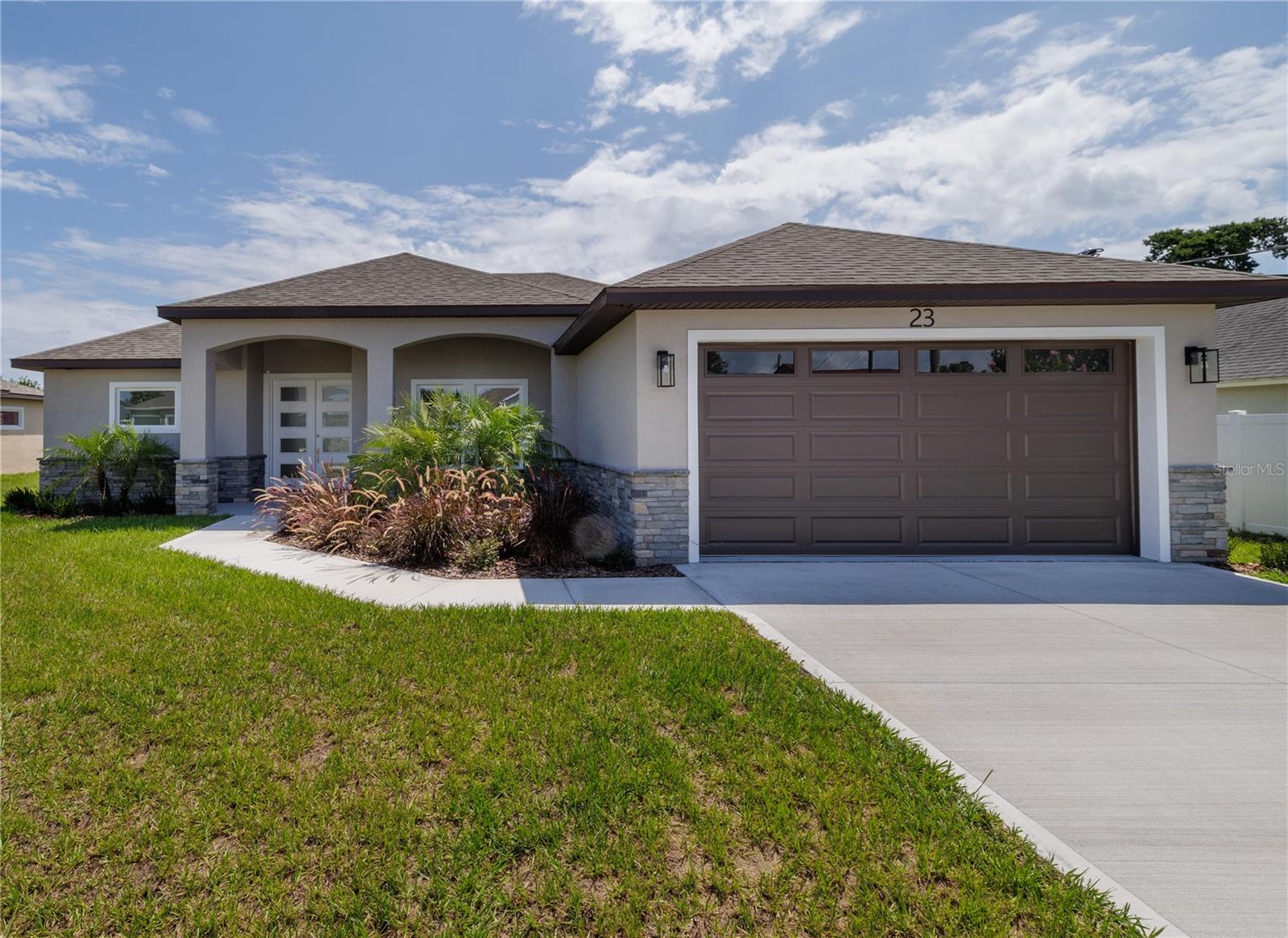 Single Family Residence in PALM COAST, FL - Daniel Dourado