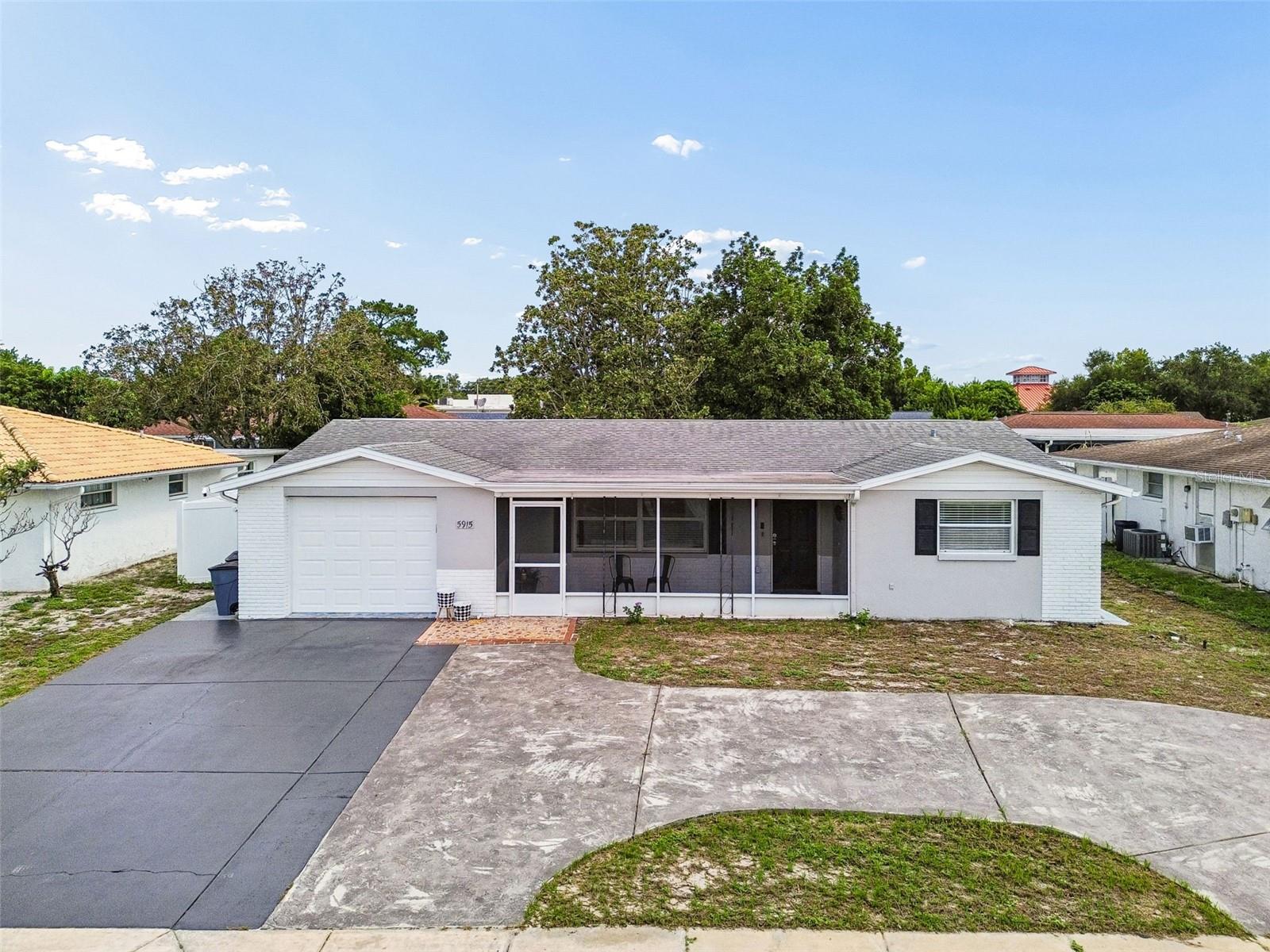 Single Family Residence in NEW PORT RICHEY, FL - Daniel Dourado