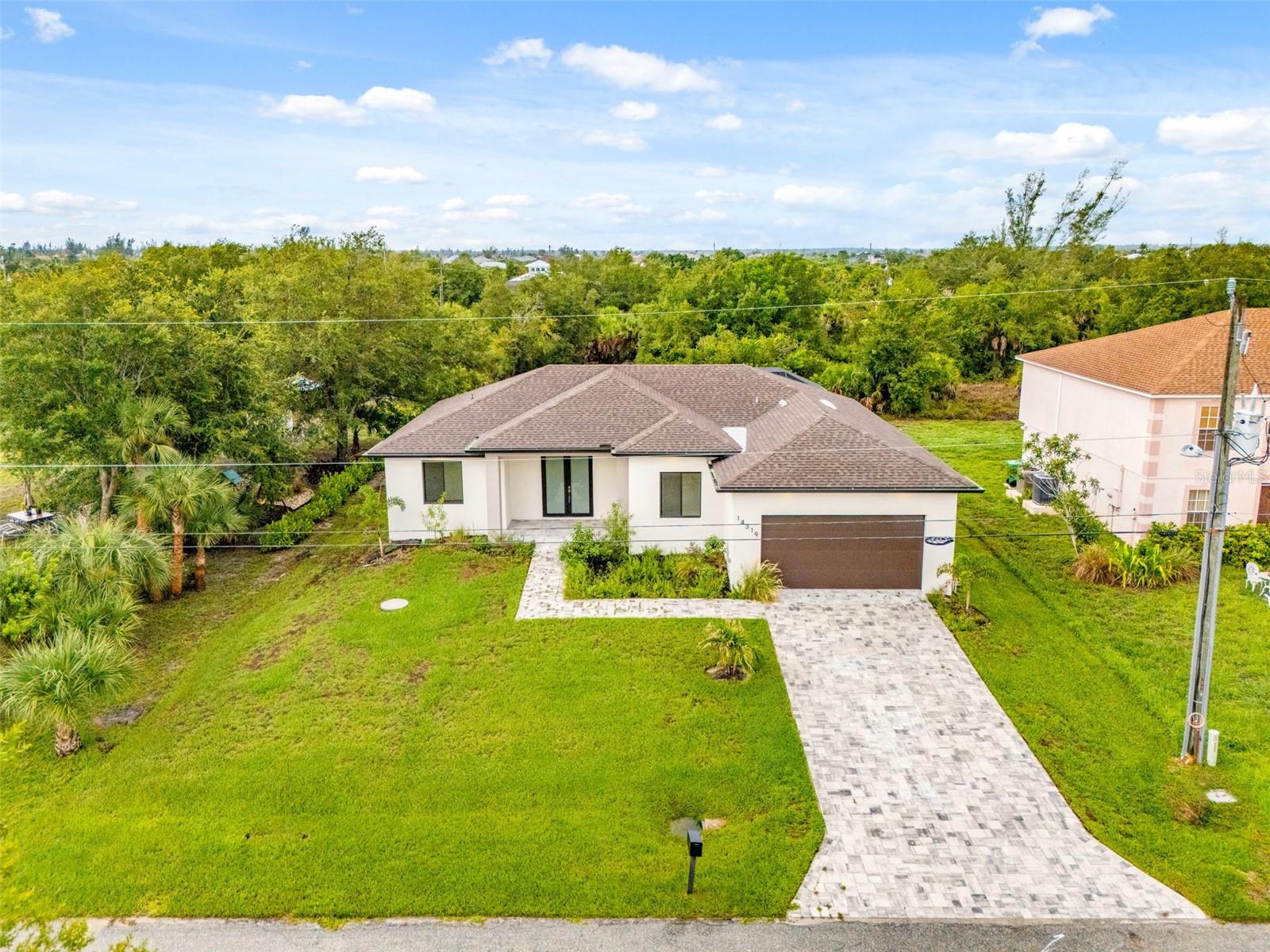 Single Family Residence in PORT CHARLOTTE, FL - Daniel Dourado