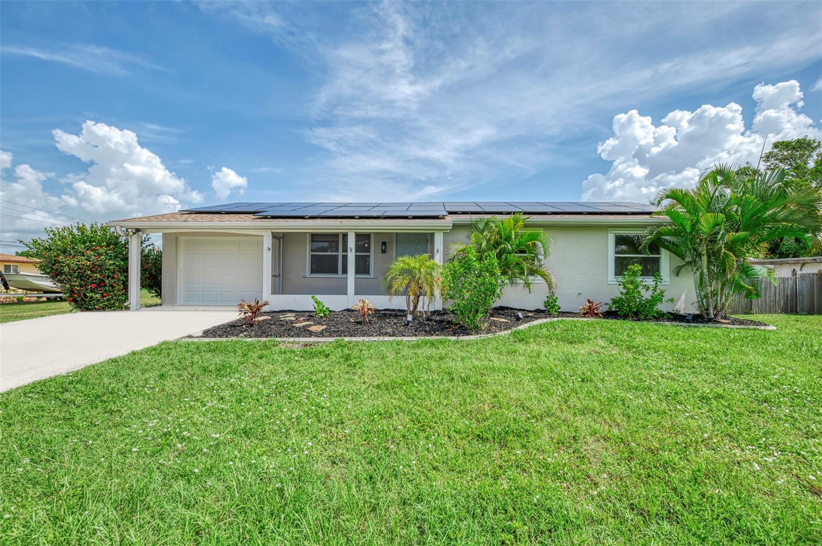 Single Family Residence in PORT CHARLOTTE, FL - Daniel Dourado