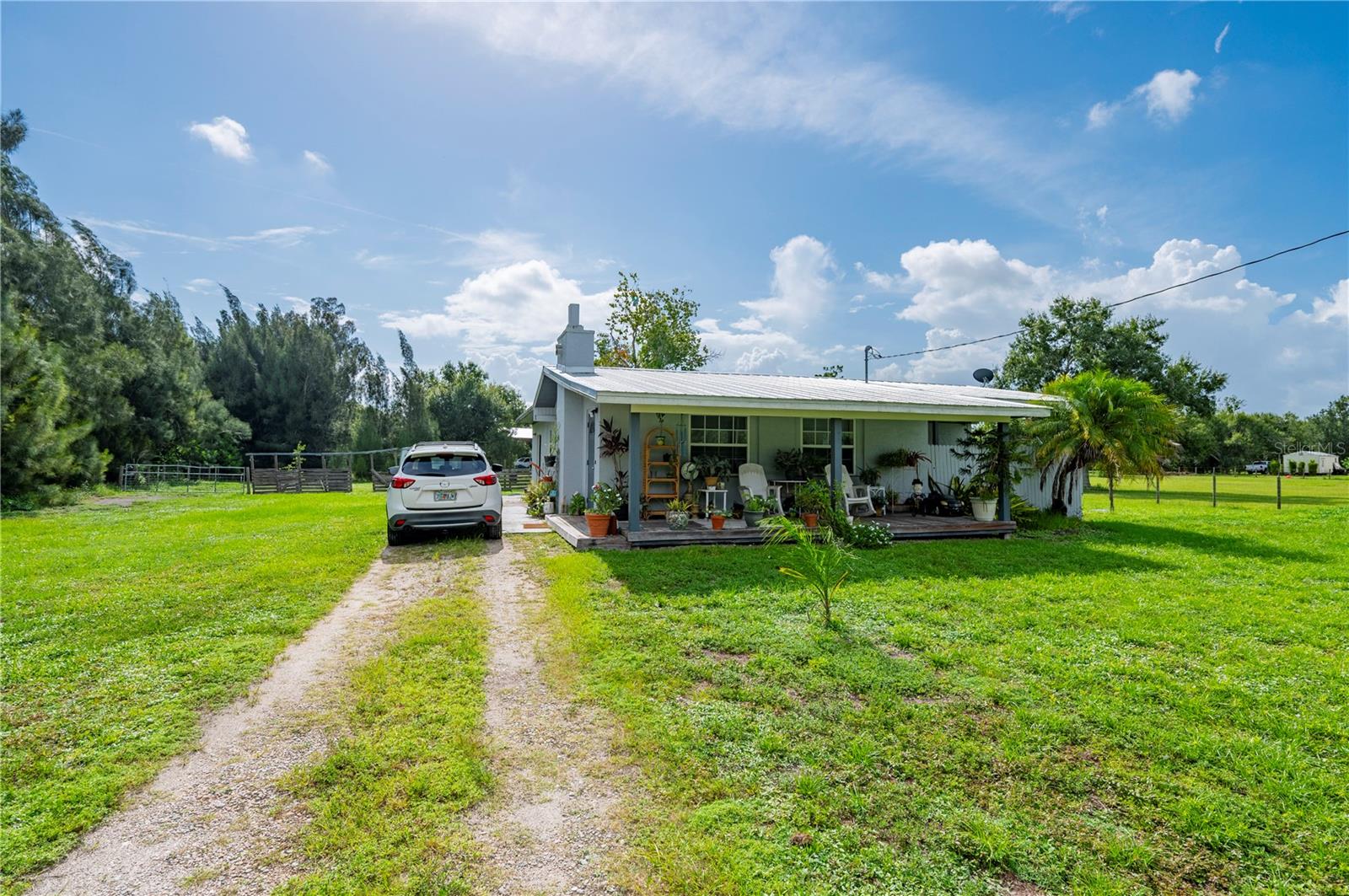 Single Family Residence em PUNTA GORDA, FL - Daniel Dourado
