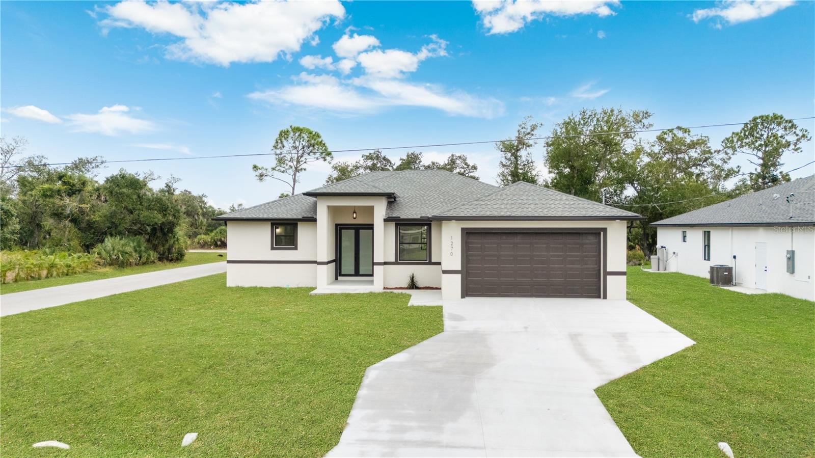 Single Family Residence in PORT CHARLOTTE, FL - Daniel Dourado