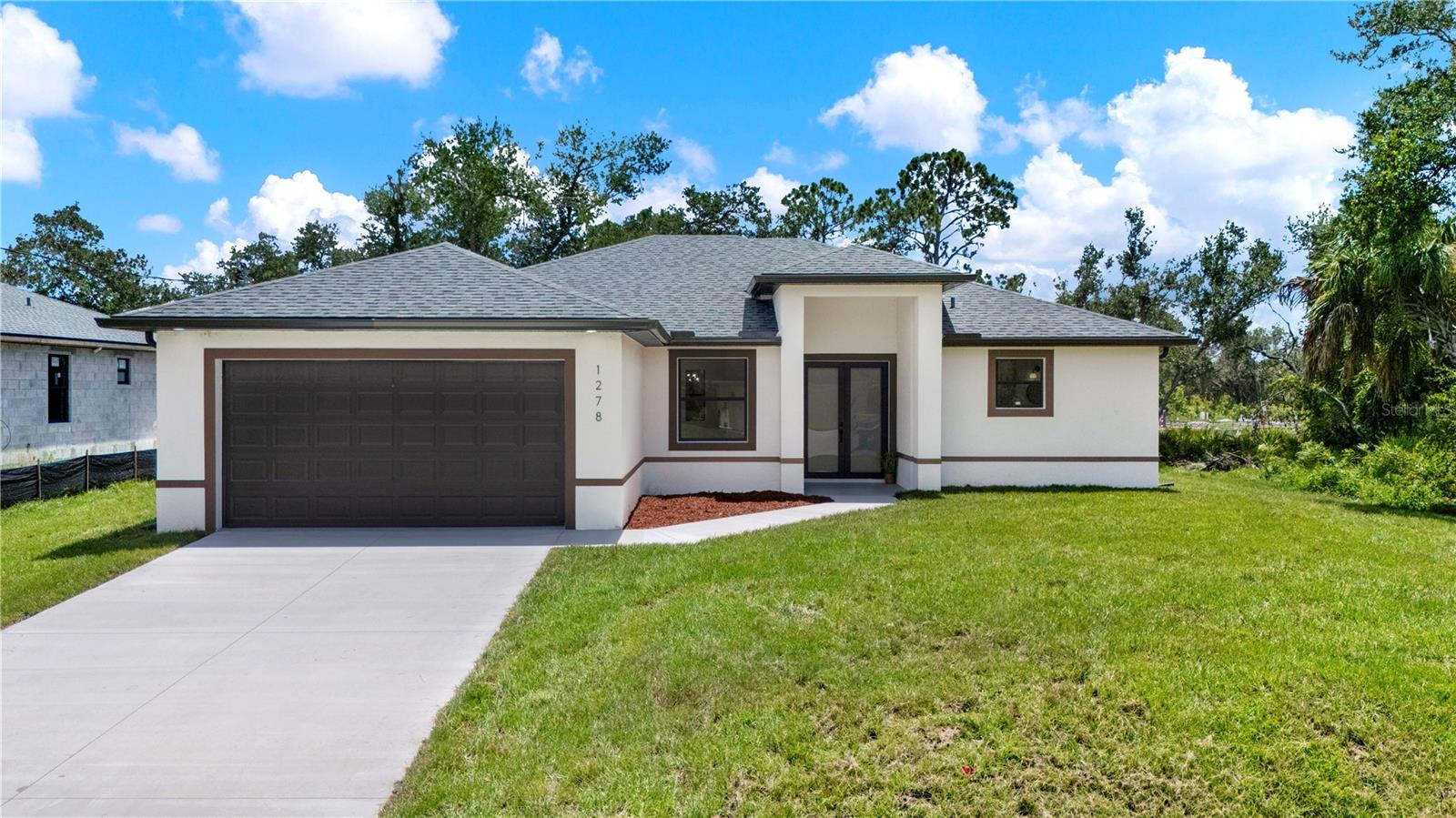 Single Family Residence in PORT CHARLOTTE, FL - Daniel Dourado