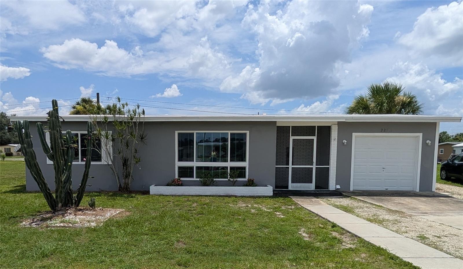 Single Family Residence in PORT CHARLOTTE, FL - Daniel Dourado