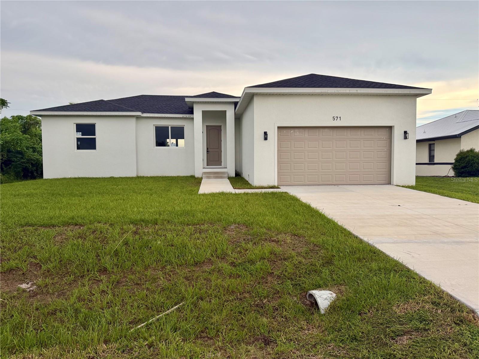 Single Family Residence in PORT CHARLOTTE, FL - Daniel Dourado