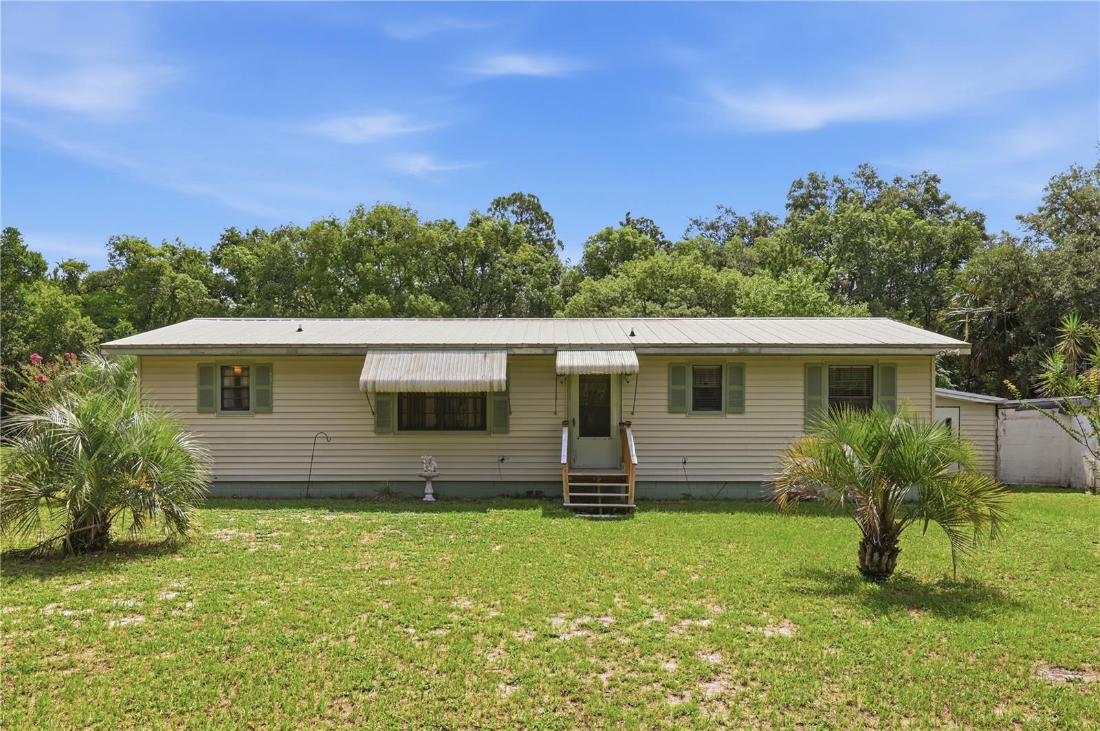 Single Family Residence in DELAND, FL - Daniel Dourado