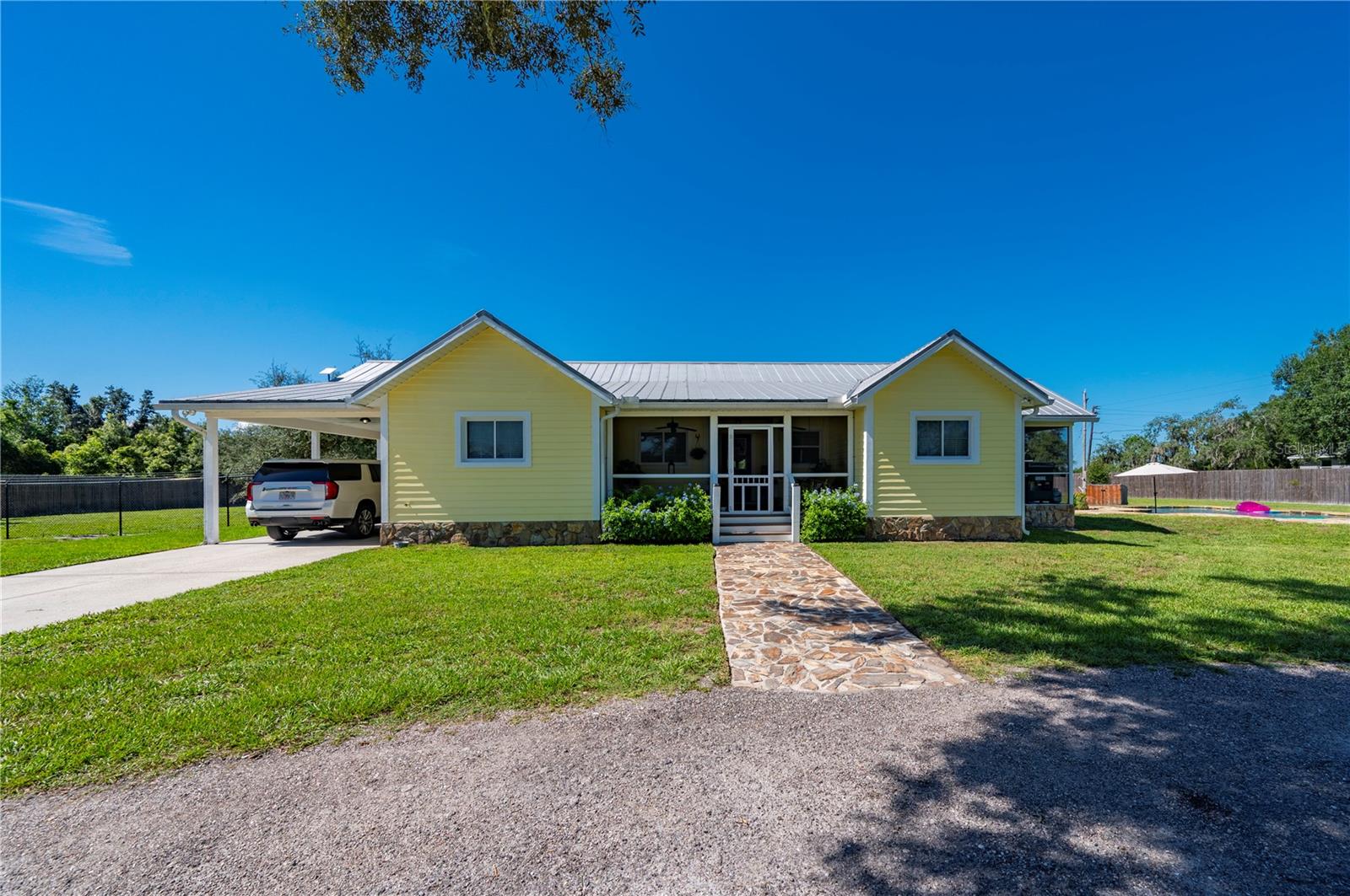 Single Family Residence em PUNTA GORDA, FL - Daniel Dourado