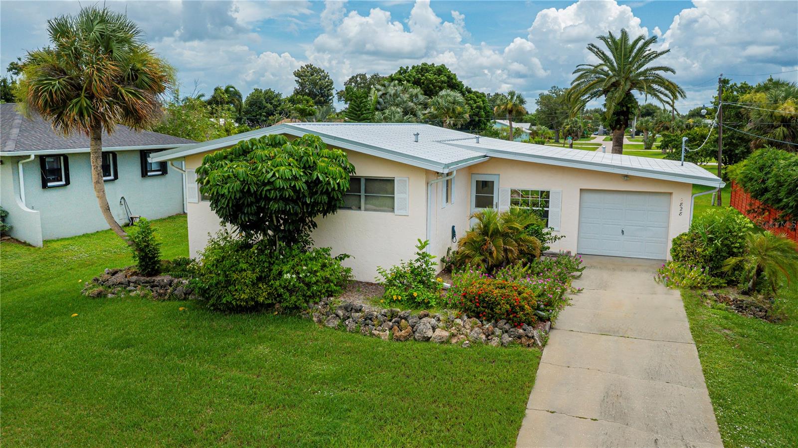 Single Family Residence em PUNTA GORDA, FL - Daniel Dourado