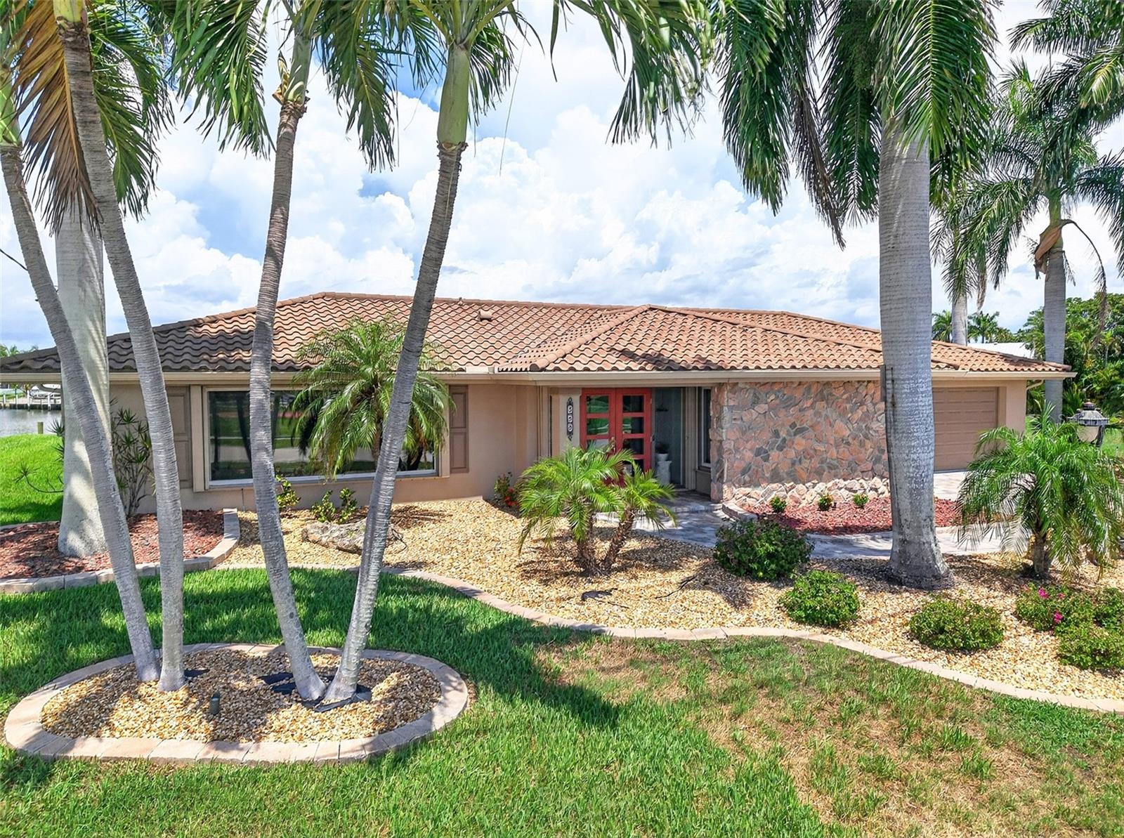 Single Family Residence em PUNTA GORDA, FL - Daniel Dourado