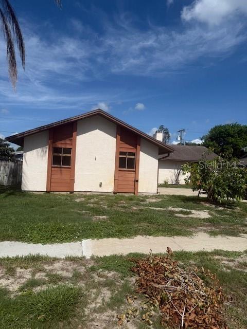 Single Family Residence em TITUSVILLE, FL - Daniel Dourado