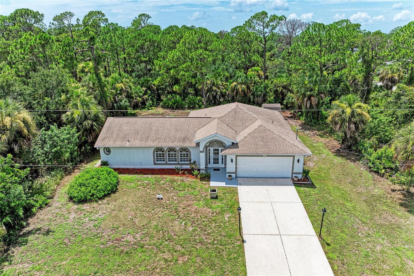 Single Family Residence em PORT CHARLOTTE, FL - Daniel Dourado