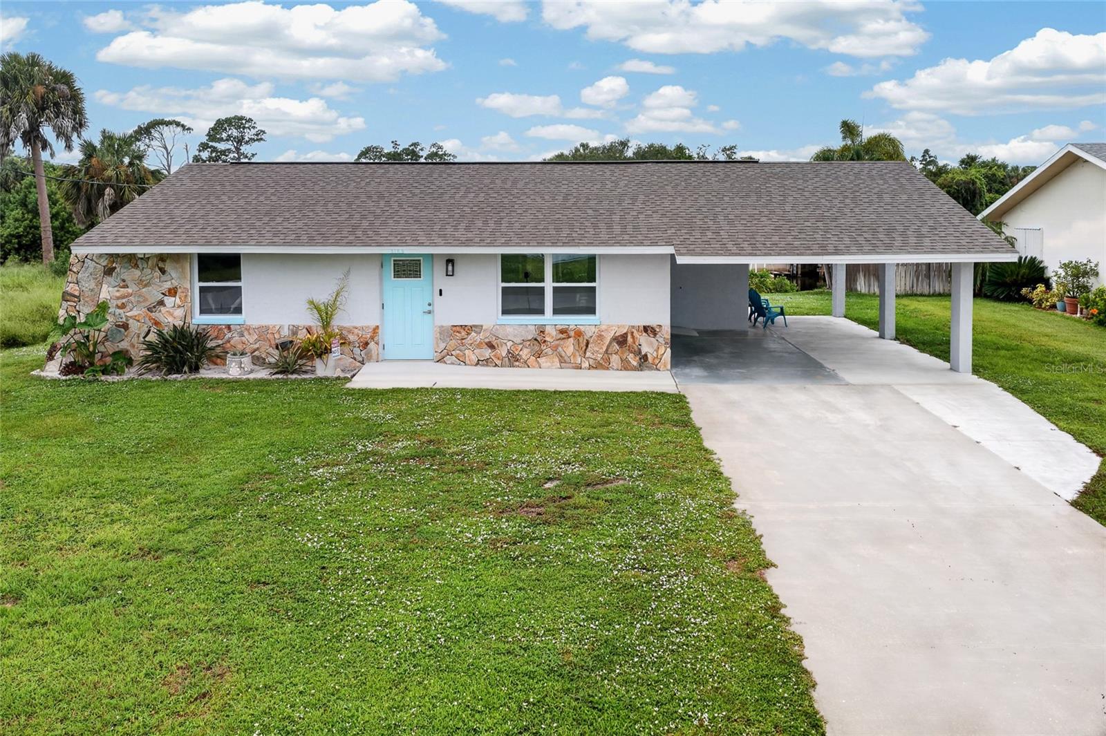 Single Family Residence em PORT CHARLOTTE, FL - Daniel Dourado
