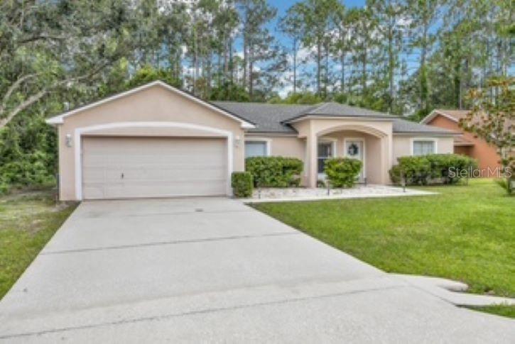 Single Family Residence in PALM COAST, FL - Daniel Dourado