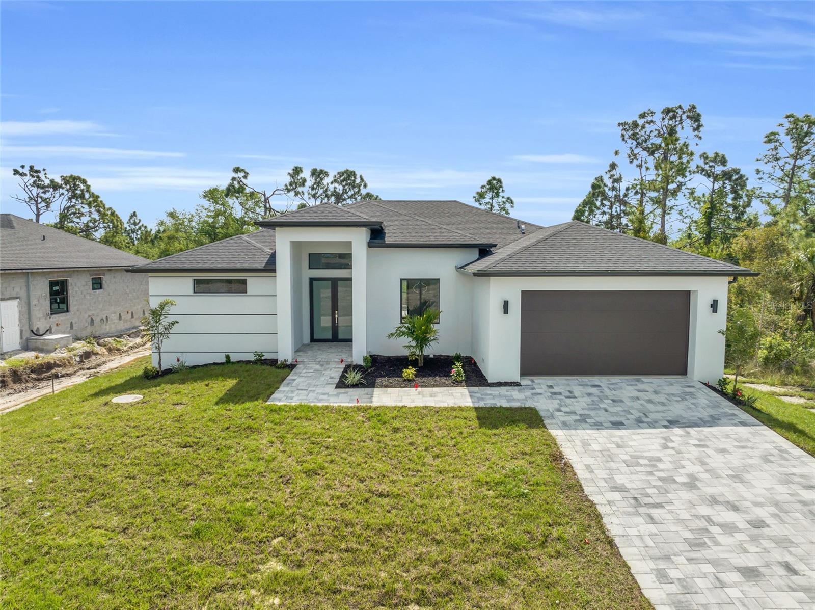 Single Family Residence em PORT CHARLOTTE, FL - Daniel Dourado