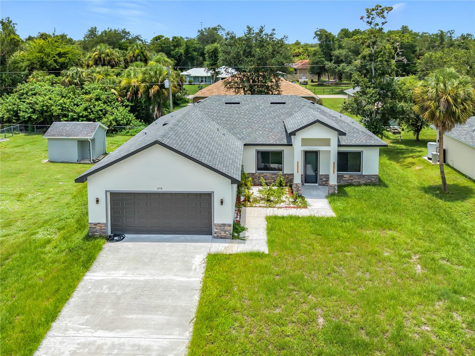 Single Family Residence em PORT CHARLOTTE, FL - Daniel Dourado