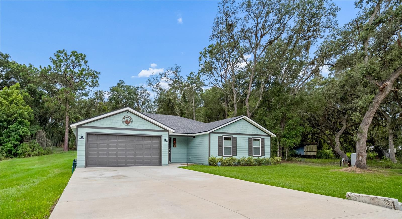 Single Family Residence em SATSUMA, FL - Daniel Dourado