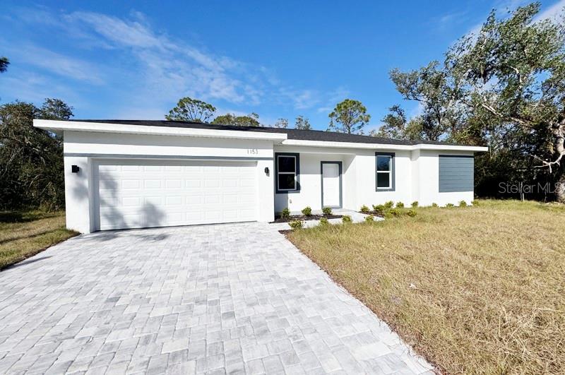 Single Family Residence em PORT CHARLOTTE, FL - Daniel Dourado