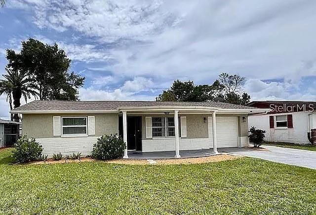 Single Family Residence em PORT RICHEY, FL - Daniel Dourado