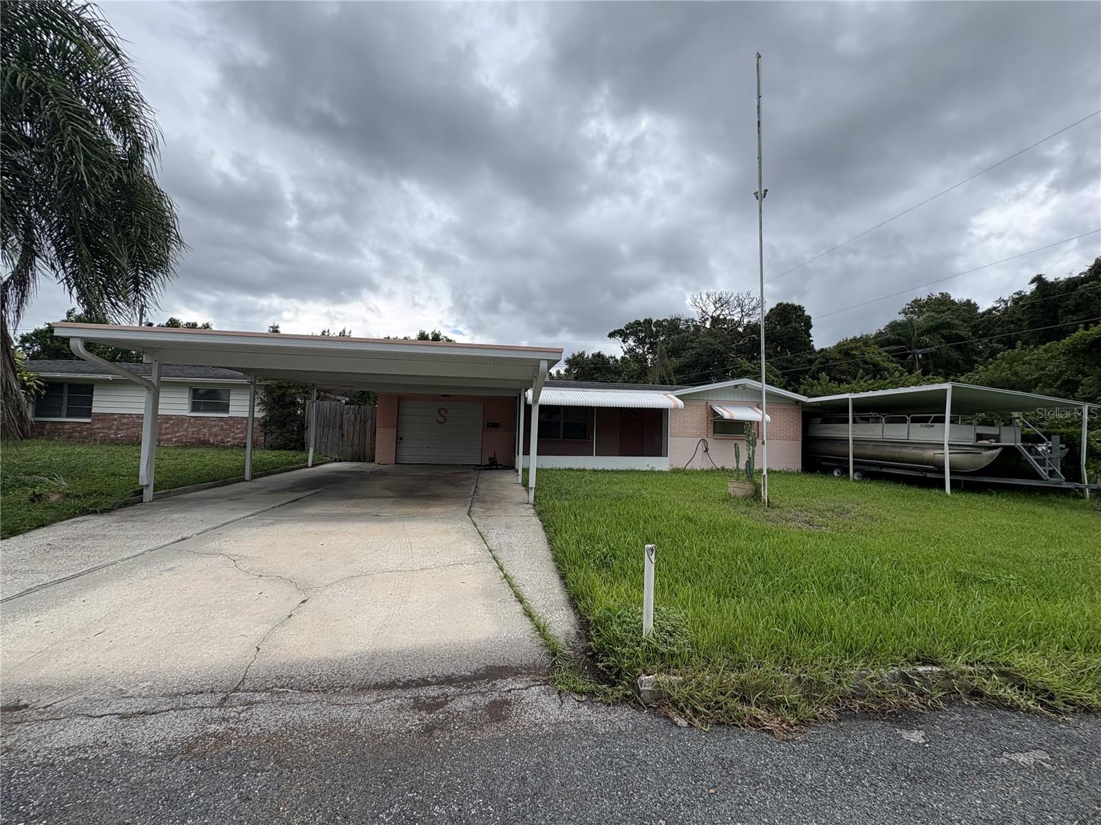 Single Family Residence em HOLIDAY, FL - Daniel Dourado