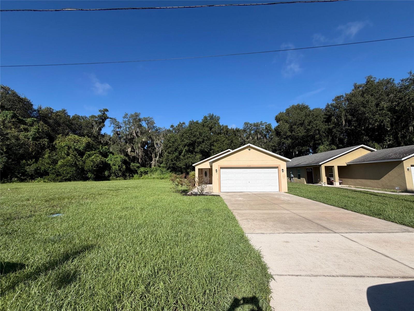 Single Family Residence em WILDWOOD, FL - Daniel Dourado