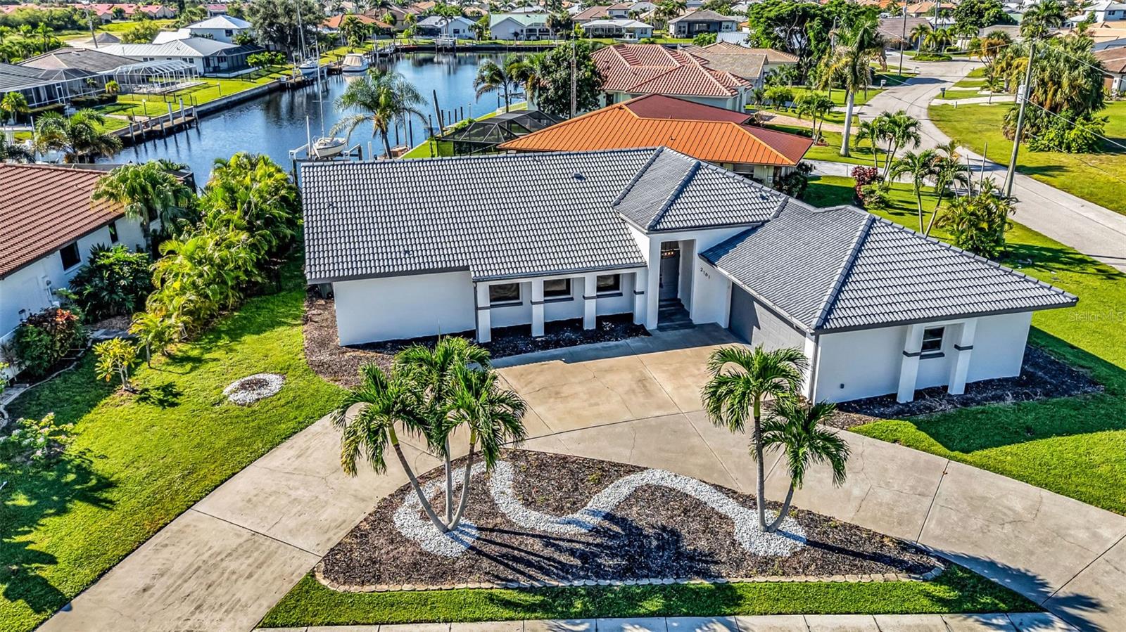 Single Family Residence em PUNTA GORDA, FL - Daniel Dourado